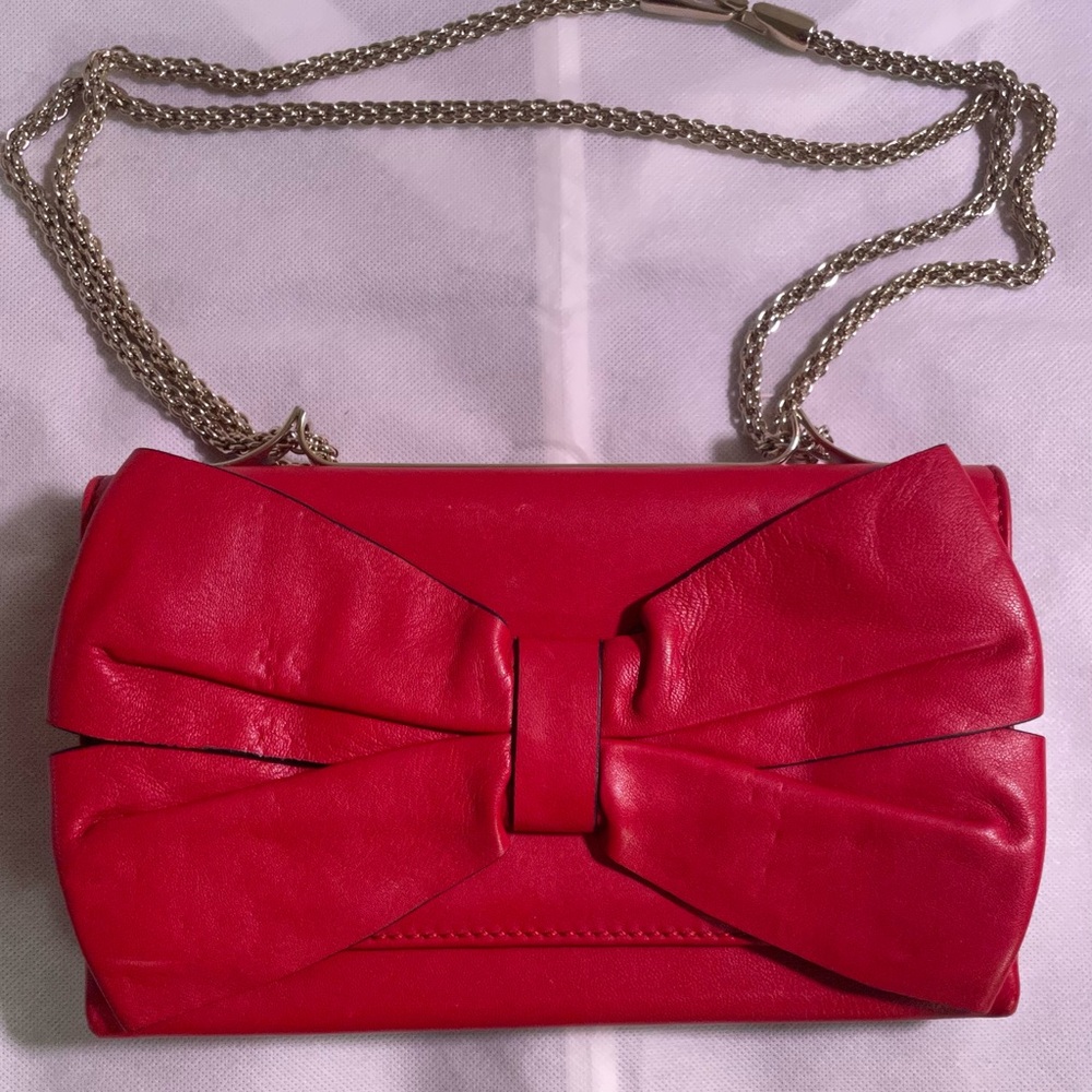 VALENTINO | vintage red leather bow clutch with gold chain